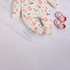 Love Patterned Cream Interlock Footed Sleepsuit