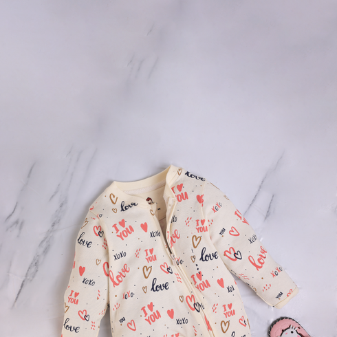 Love Patterned Cream Interlock Footed Sleepsuit