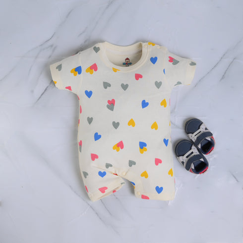 Cream Hearts Patterned Buttoned Romper