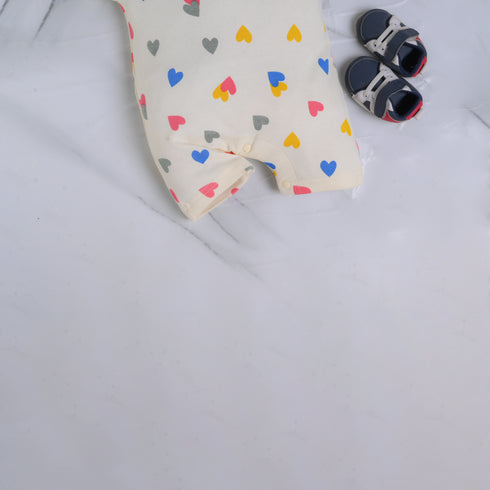 Cream Hearts Patterned Buttoned Romper